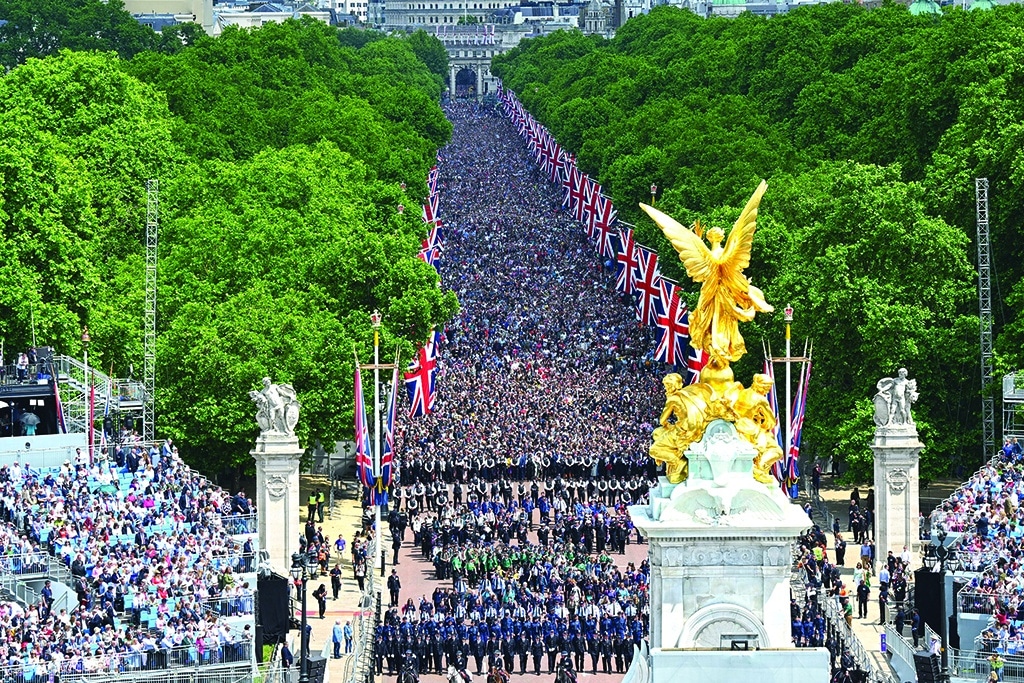  Members of the public fill The Mall ahead of a fly-past over Buckingham Palace, during the Queen's Birthday Parade, the Trooping the Color, as part of Queen Elizabeth II's Platinum Jubilee celebrations, in London.—AFP photos