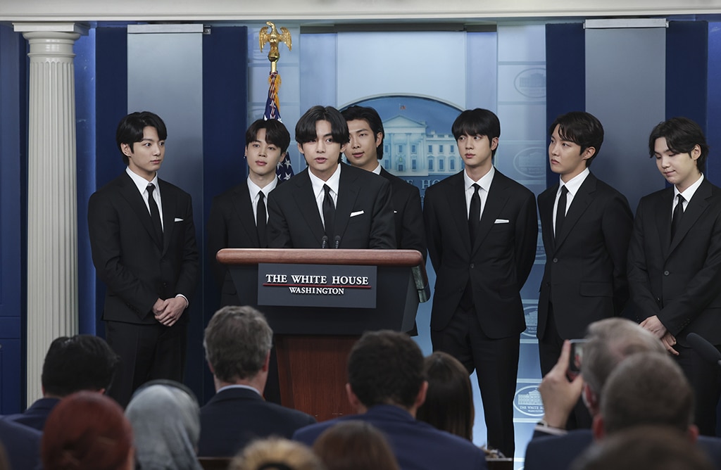 (From left to right) Jungkook, Jimin, V, RM, Jin, J-Hope and Suga of the South Korean pop group BTS speak at the daily press briefing at the White House in Washington, DC.—AFP