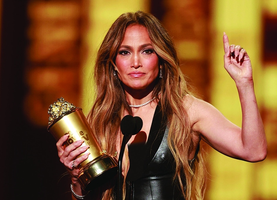 US actress-singer Jennifer Lopez receives the MTV Generation Award on stage.