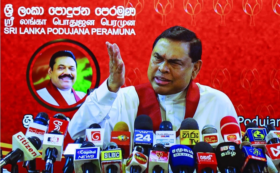 COLOMBO: Former Sri Lanka's finance minister Basil Rajapaksa, the younger brother of Sri Lanka's President Gotabaya Rajapaksa, speaks during a press conference to announce his resignation as member of parliament, in Colombo on June 9, 2022. – AFP