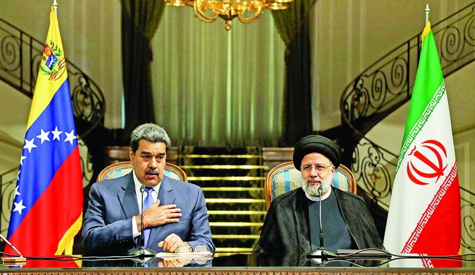TEHRAN: A handout picture provided by the Iranian presidency shows Iran's President Ebrahim Raisi (right) and Venezuela's President Nicolas Maduro (left) giving a joint statement after their meeting in the capital Tehran on June 11, 2022. - AFP