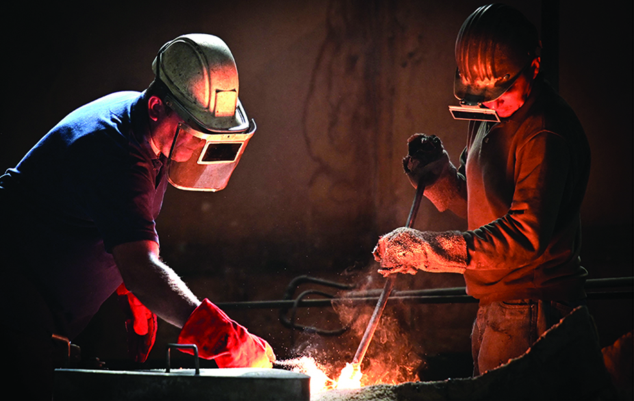 BERDYANSK: Workers pour metal at a private Berdyansk foundry in Berdyansk, amid the ongoing Russian military action in Ukraine. - AFP