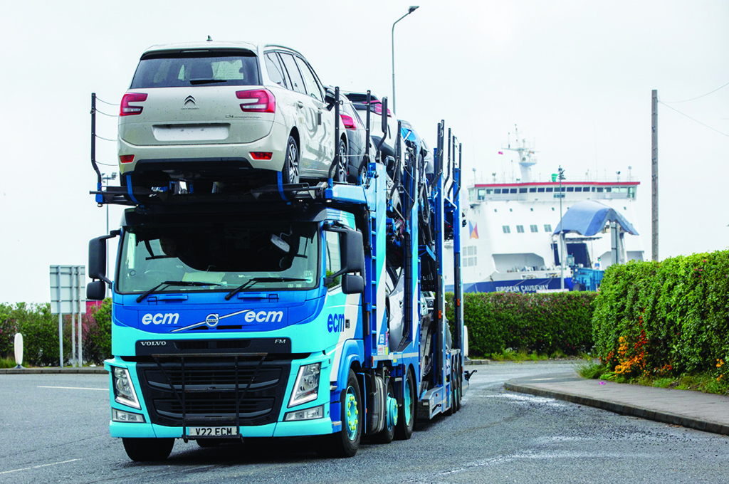 BELFAST: A car-transporter lorry leaves Larne port, north of Belfast in Northern Ireland, after arriving on a ferry. The UK government on Tuesday announced its intention to drastically overhaul post-Brexit trade rules in Northern Ireland, arguing the plan was needed to end political paralysis in the territory but risking a trade war with the EU. - AFP