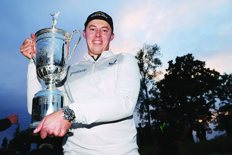 BROOKLINE: Matt Fitzpatrick of England poses with the US Open Championship trophy after winning during the final round of the 122nd US Open Championship at The Country Club on June 19, 2022. - AFP