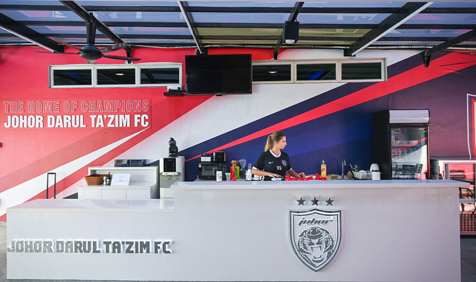 JOHOR BAHRU: This picture shows a nutritionist preparing food at the Johor Darul Ta'zim football club training centre in Johor Bahru. - AFP