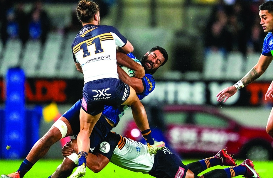 AUCKLAND: Blues’ Akira Ioane (center) is tackled by Brumbies’ Andy Muirhead (left) and Pete Samu during the Super Rugby Pacific semifinal match between Australia’s Brumbies and New Zealand’s Blues at Eden Park in Auckland on June 11, 2022. - AFP