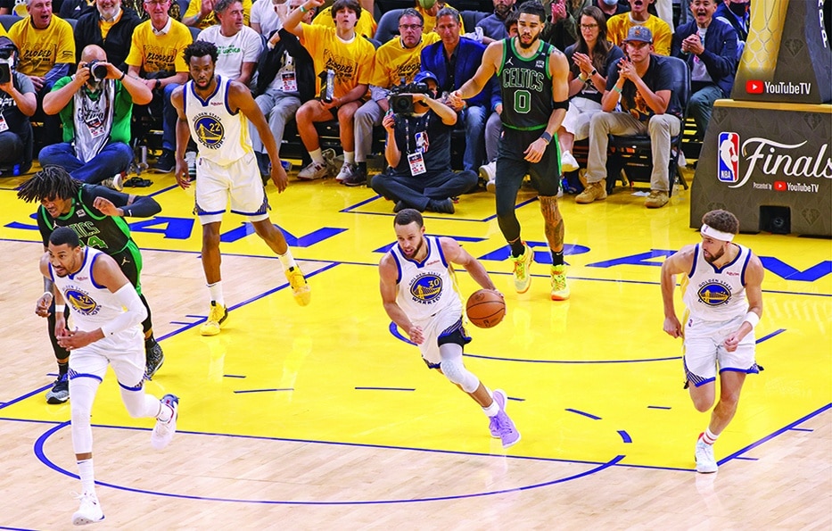 SAN FRANCISCO: Stephen Curry #30 of the Golden State Warriors brings the ball up court against the Boston Celtics during Game Five of the 2022 NBA Finals on June 13, 2022.- AFP