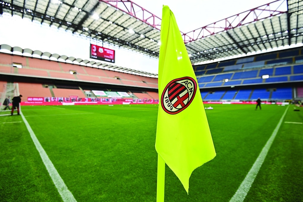 MILAN: In this file photo taken on April 21, 2021 The logo of AC Milan is pictured on a corner flag prior to the Italian Serie A football match AC Milan vs Sassuolo at the San Siro stadium in Milan. - AFP