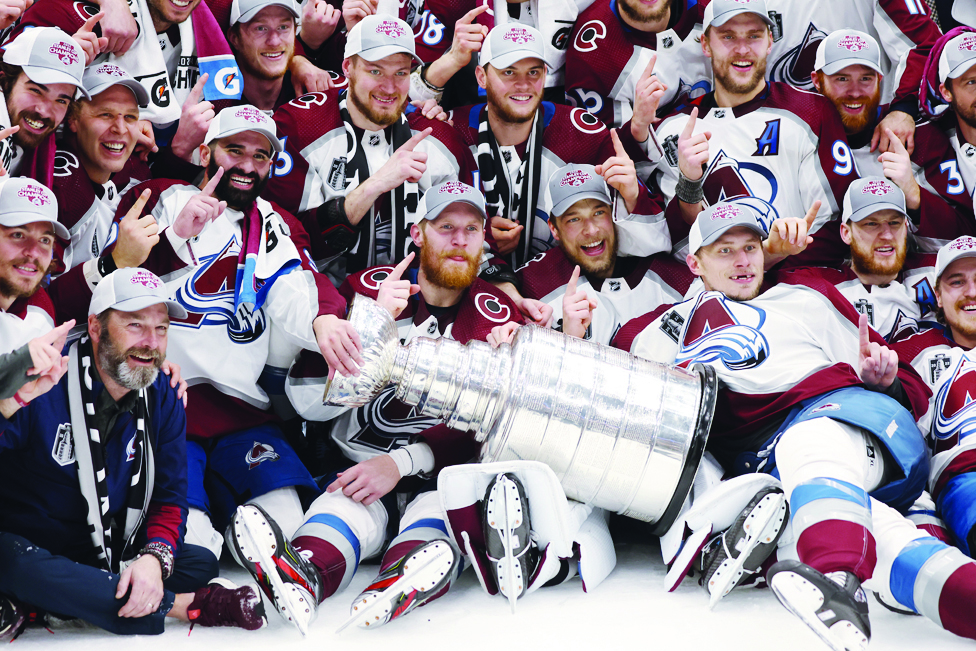 TAMPA: Colorado Avalanche coaches and players pose for a photo after defeating the Tampa Bay Lightning 2-1 in Game Six of the 2022 NHL Stanley Cup Final at Amalie Arena on June 26, 2022. - AFP