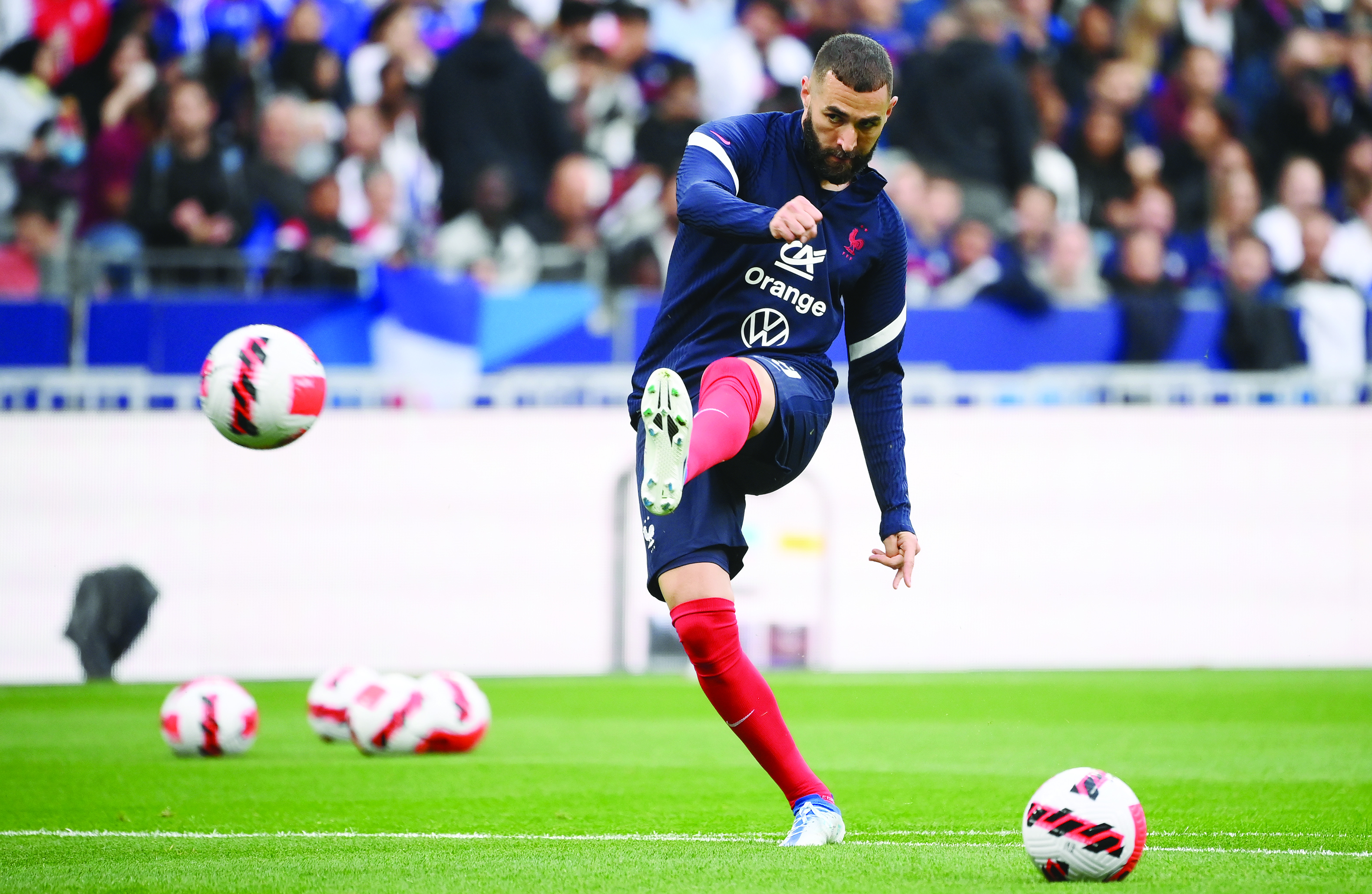 France's forward Karim Benzema warms up prior to the UEFA Nations League - League A Group 1 first leg football match between France and Denmark at the Stade de France in Saint-Denis, north of Paris, on June 3, 2022. (Photo by Franck FIFE / AFP)