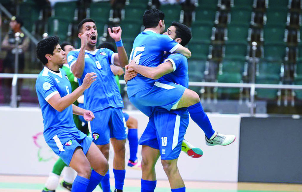 RIYADH: Kuwaiti players celebrate their victory against Palestine after their quarter finals match at the 2022 Arab Futsal Championship.