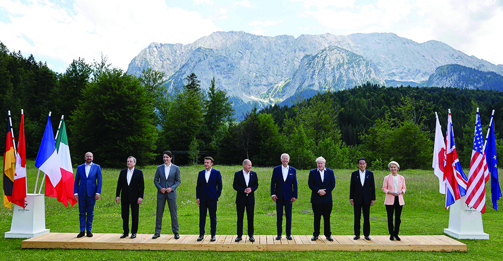 ELMAU CASTLE, Germany: (From left) European Council President Charles Michel, Italy's Prime Minister Mario Draghi, Canada's Prime Minister Justin Trudeau, France's President Emmanuel Macron, Germany's Chancellor Olaf Scholz, US President Joe Biden, Britain's Prime Minister Boris Johnson, Japan's Prime Minister Fumio Kishida and European Commission President Ursula von der Leyen pose for a family photo during the G7 Summit on June 26, 2022. - AFP
