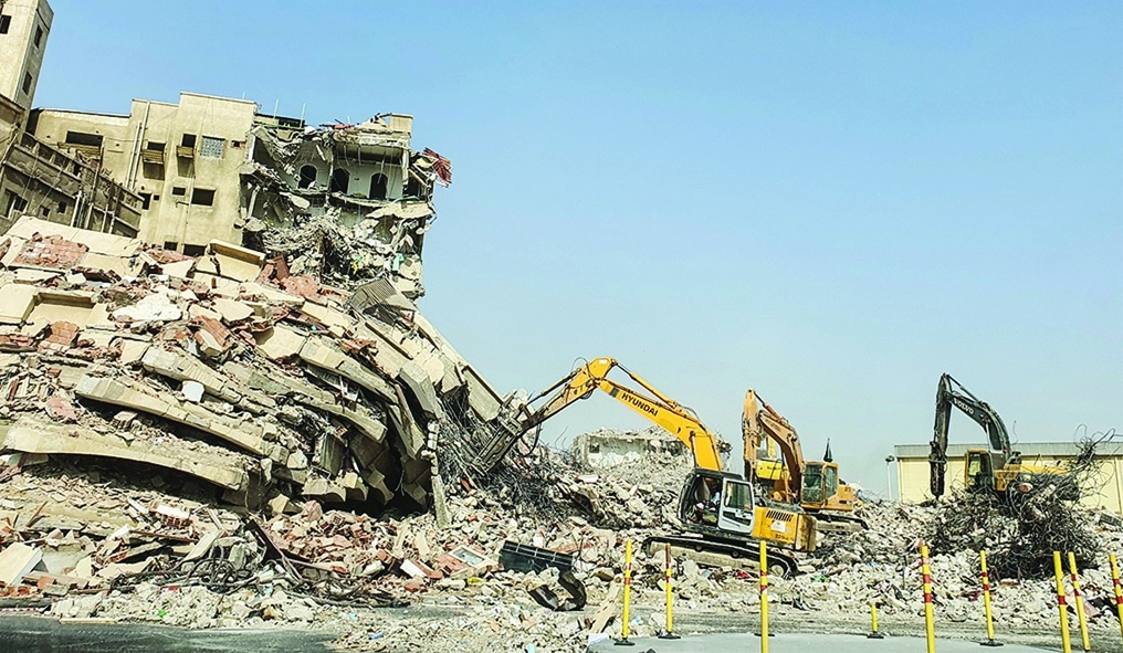 JEDDAH: Bulldozers demolish buildings in this March 14, 2022 file photo as part of a $20 billion clearance and construction government project. - AFP