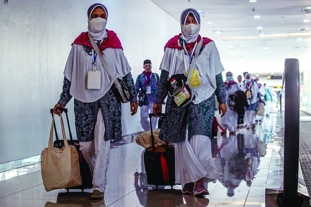 SURABAYA, Indonesia: Indonesian pilgrims prepare to depart from Juanda International Airport on June 4, 2022, for the first time since the COVID-19 pandemic. - AFP