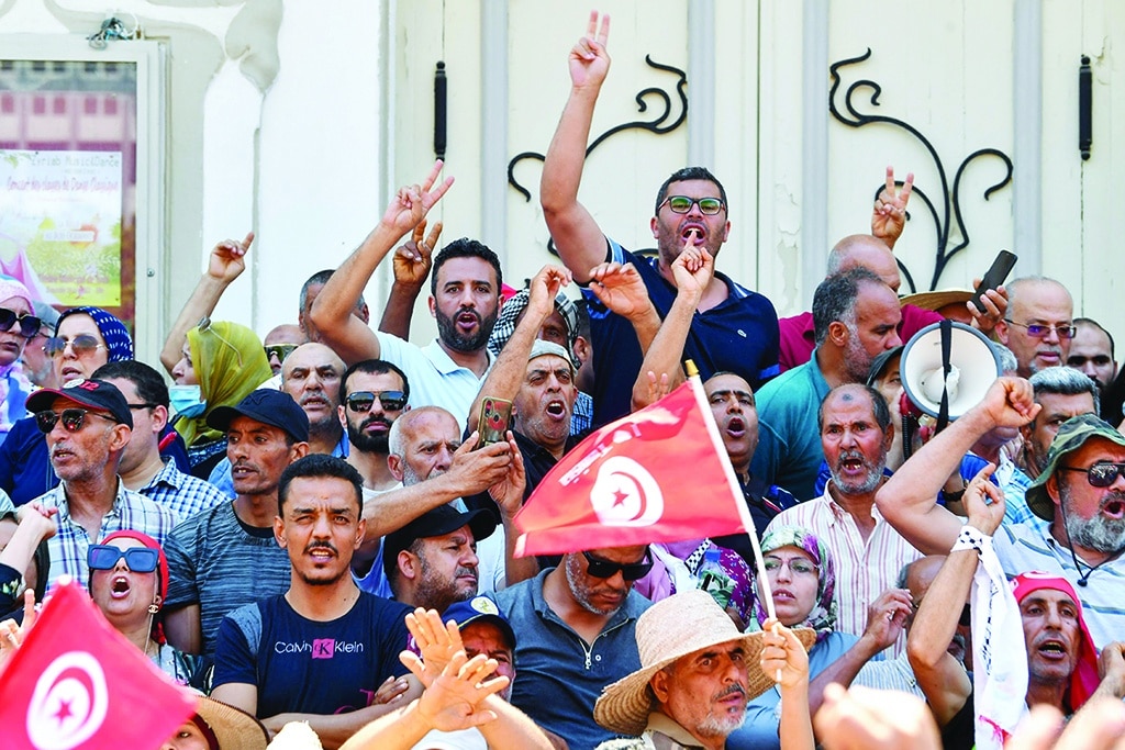 TUNIS: Tunisian protesters chant slogans against President Kais Saied and the upcoming constitutional referendum at a rally in the capital on June 19, 2022. - AFP