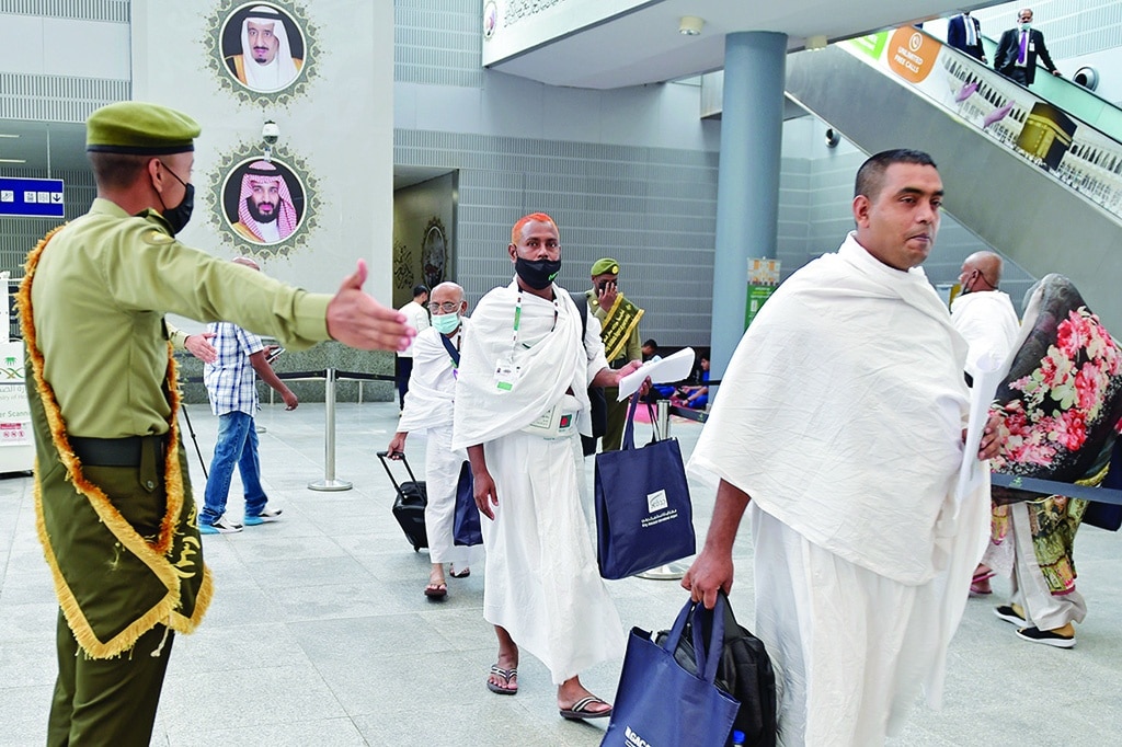 JEDDAH: Muslim pilgrims arrive at King Abdulaziz International Airport in Saudi Arabia's Red Sea coastal city of Jeddah on June 5, 2022, prior to the annual hajj pilgrimage in the holy city of Makkah. - AFP