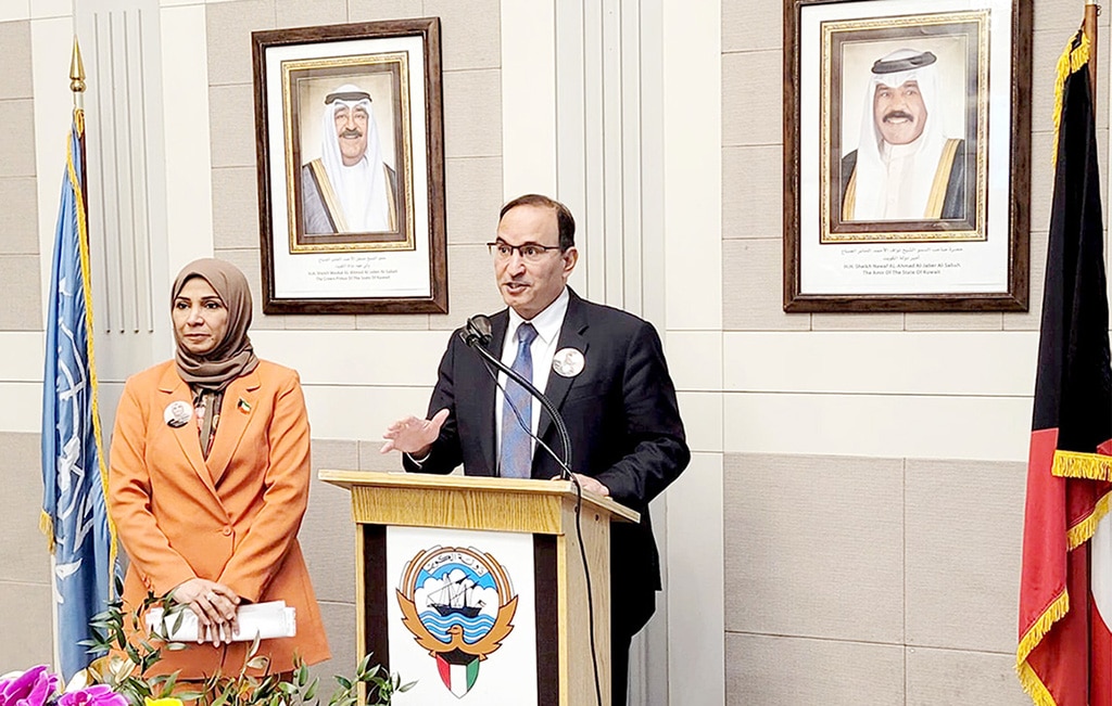 NEW YORK: Ambassador Mansour Al-Otaibi speaks at the reception with Rehab Boresli. - KUNA