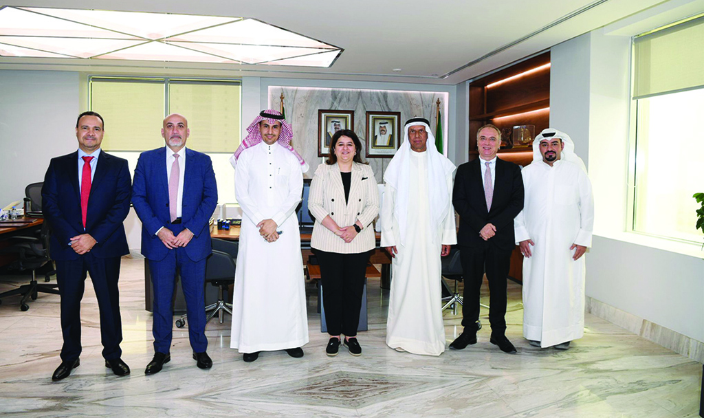 KUWAIT: Officials pose for a group picture after the initiative is submitted to Minister of State for Communications and Information Technology Affairs Dr Rana Abdullah Al-Fares.