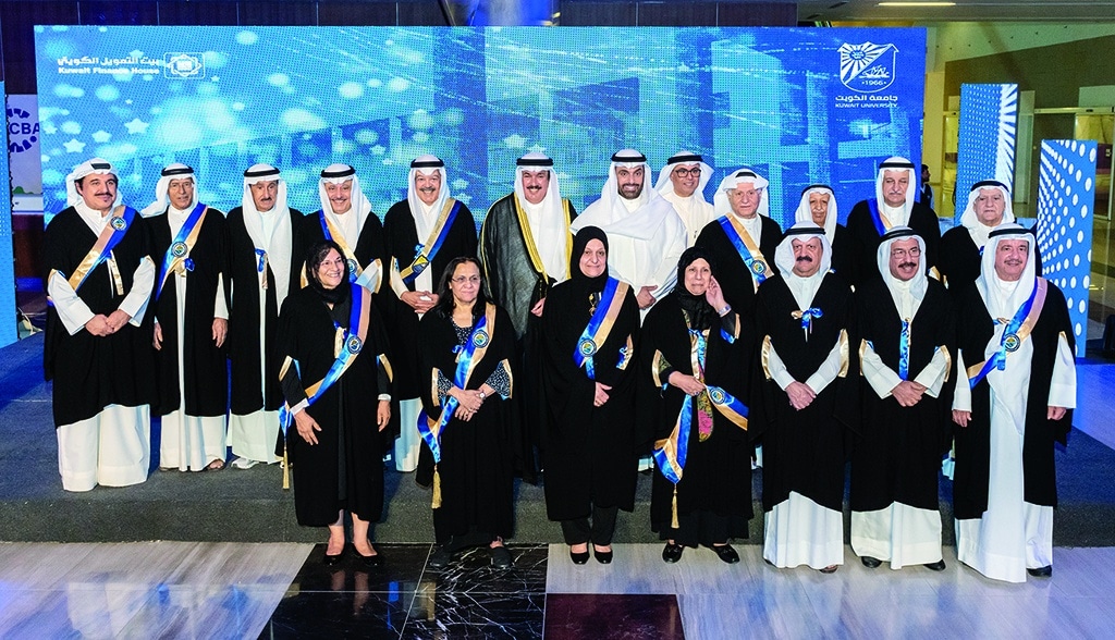 KUWAIT: Minister of Education takes a group photo during the golden jubilee celebration of the graduation of the first batch of faculty of commerce, economy and politics Education.- KUNA photos