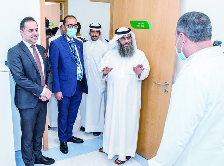KUWAIT: Officials tour the Health Assurance Hospitals Company's new primary healthcare center in Jahra. - KUNA photos