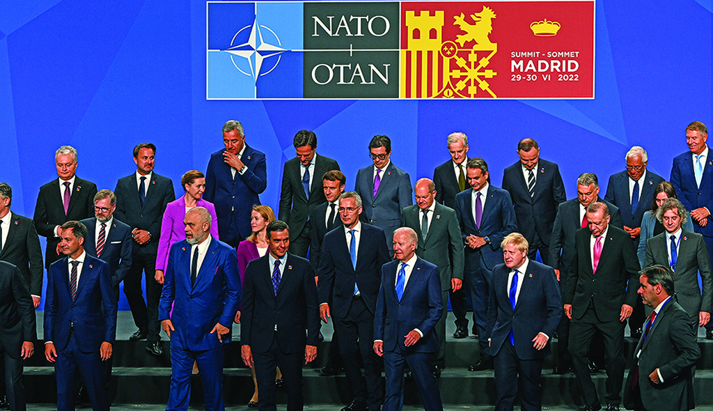MADRID, Spain: US President Joe Biden (C) and other leaders depart after posing for the official group photograph during the NATO summit at the Ifema congress centre in Madrid. - AFP