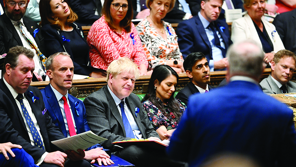 LONDON: Handout photograph shows Britain's Prime Minister Boris Johnson reacting during the weekly Prime Minister's Questions (PMQs) session in the House of Commons, in London. - AFP