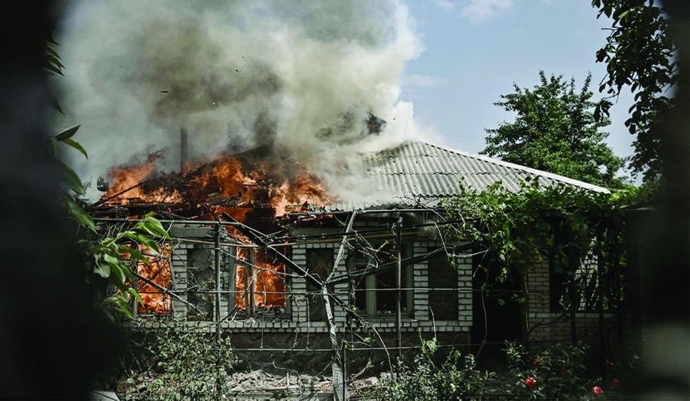 LYSYCHANSK: A house burns after being shelled during an artillery duel between Ukrainian and Russian troops in the city of Lysychansk, eastern Ukrainian region of Donbas, on June 11, 2022. - AFP