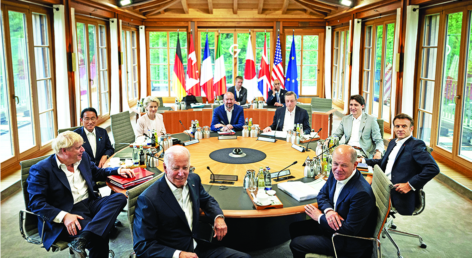 ELMAU CASTLE: (From center counterclockwise) US President Joe Biden, German Chancellor Olaf Scholz, France's President Emmanuel Macron, Canadian Prime Minister Justin Trudeau, Italian Prime Minister Mario Draghi, European Council President Charles Michel, President of the European Commission Ursula von der Leyen, Japanese Prime Minister Fumio Kishida and British Prime Minister Boris Johnson attend a working session during the G7 leaders summit at Bavaria's Schloss Elmau castle on June 28, 2022 on the last day of the G7 Summit. - AFP
