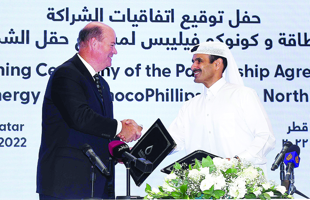 DOHA: Qatar's Minister of State for Energy Affairs and President and CEO of Qatar Energy Saad Sherida Al-Kaabi and Ryan Lance, CEO of ConocoPhillips, attend a signing ceremony on June 20, 2022. - AFP