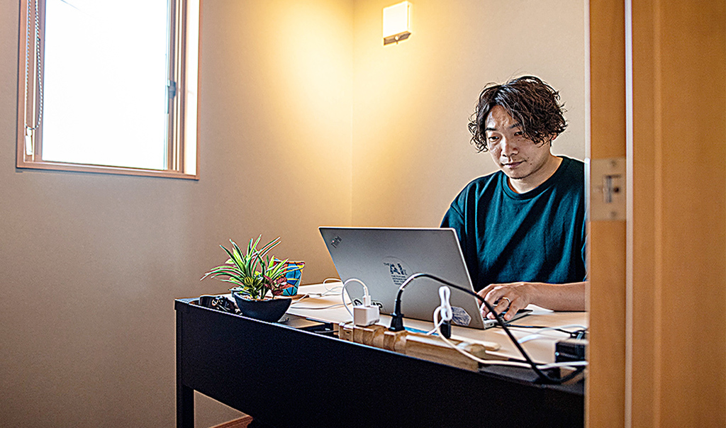 FUJISAWA, Japan: In this picture taken on June 30, 2022 Kazuki Kimura works in his house in Fujisawa, Kanagawa Prefecture. - AFP