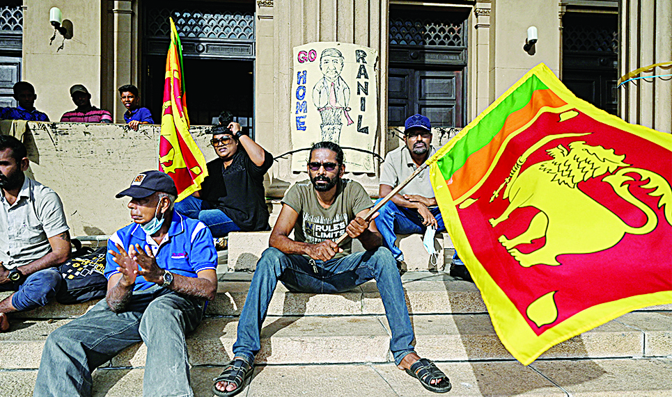 COLOMBO, Sri Lanka: Demonstrators stage a protest against Sri Lankan President Ranil Wickremesinghe at Presidential Secretariat in Colombo on July 20, 2022. - AFP