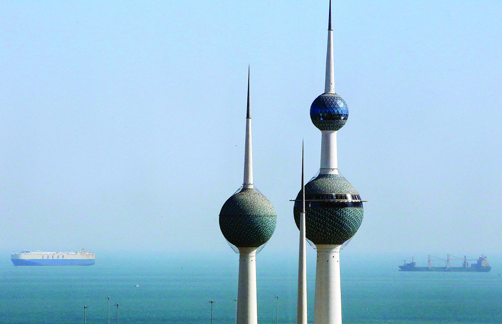 A picture taken on October 11, 2021 from Kuwait City's Al-Hamra highrise shows the landmark Kuwiat water towers as cargo ships, in the background, cross the Gulf waters off the shore of oil-rich Gulf emirate. (Photo by YASSER AL-ZAYYAT / AFP) (Photo by YASSER AL-ZAYYAT/AFP via Getty Images)
