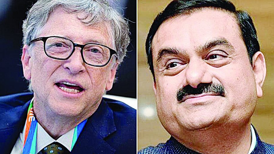 Bill Gates (left) and Gautam Adani
