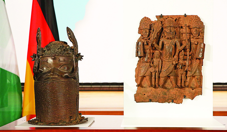 Sculptures known as the 'Benin Bronzes' are pictured at a ceremony for the signing of an agreement of intent to return them to Nigeria at the German foreign ministry in Berlin, Germany on July 1, 2022. - AFP