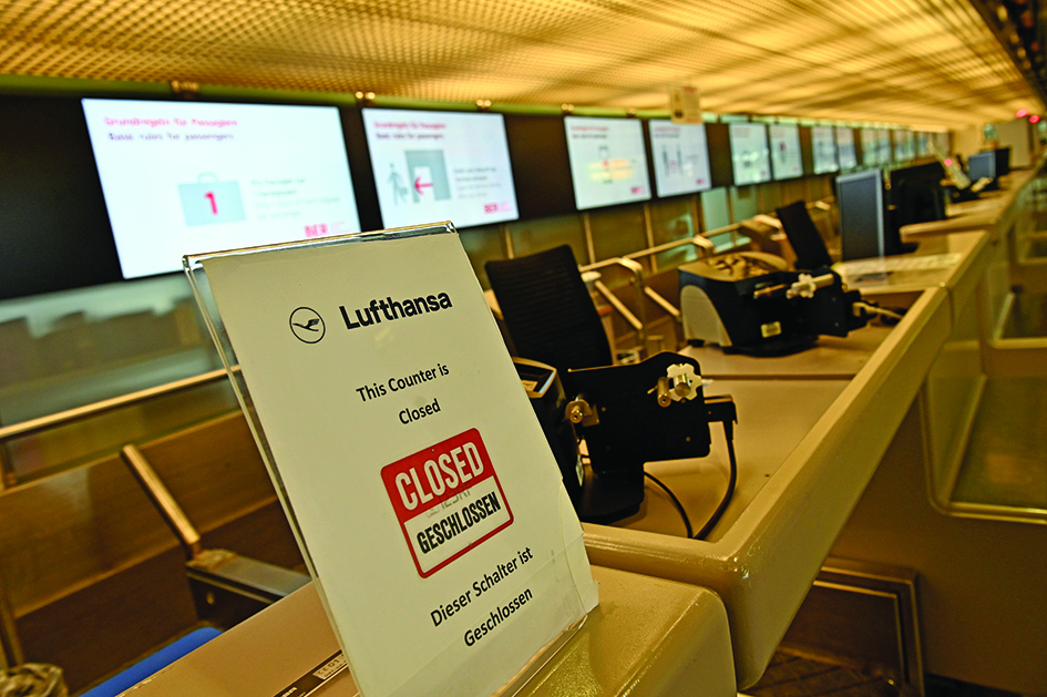 BERLIN, Germany: This file photo taken on June 11, 2020 shows a closed check-in desk of German airline Lufthansa at Berlin's Tegel Airport. - AFP