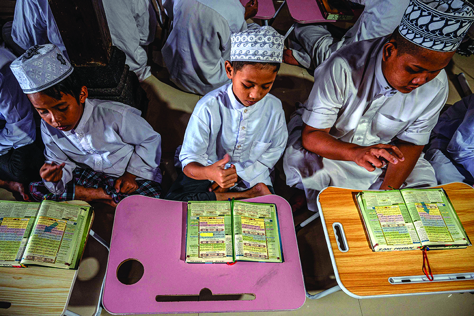 Students learn to recite the Quran using sign language at an Islamic boarding school for deaf children in Sleman. At an Islamic boarding school in a sleepy neighborhood on the outskirts of Indonesian city Yogyakarta, the evocative sound of Quranic recitation is nowhere to be heard. - AFP photos