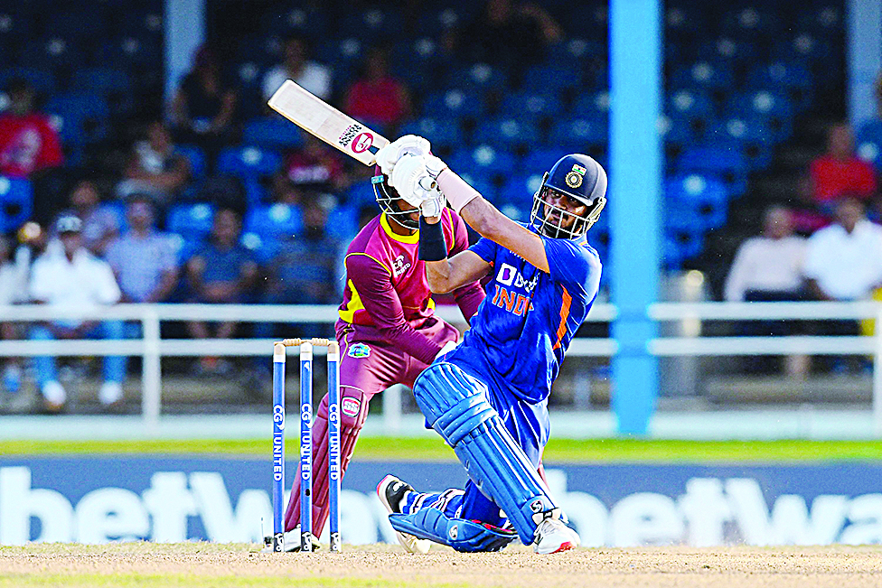 PORT OF SPAIN: Axar Patel of India hits 4 during the 2nd ODI match between West Indies and India at Queens Park Oval, Port of Spain, Trinidad and Tobago, on July 24, 2022.- AFP