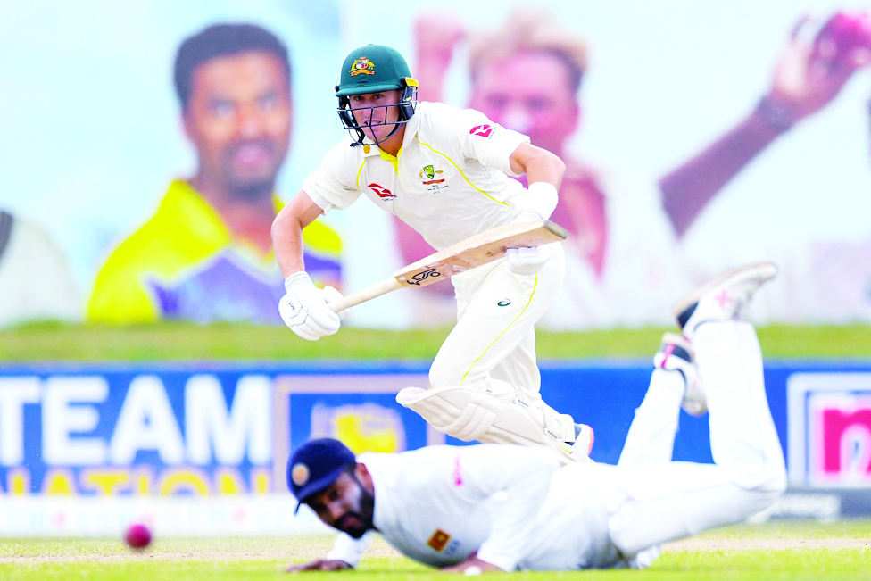 GALLE: Australia's Marnus Labuschagne plays a shot during the fourth day of the second cricket Test match between Sri Lanka and Australia at the Galle International Cricket Stadium in Galle on July 11, 2022. - AFP