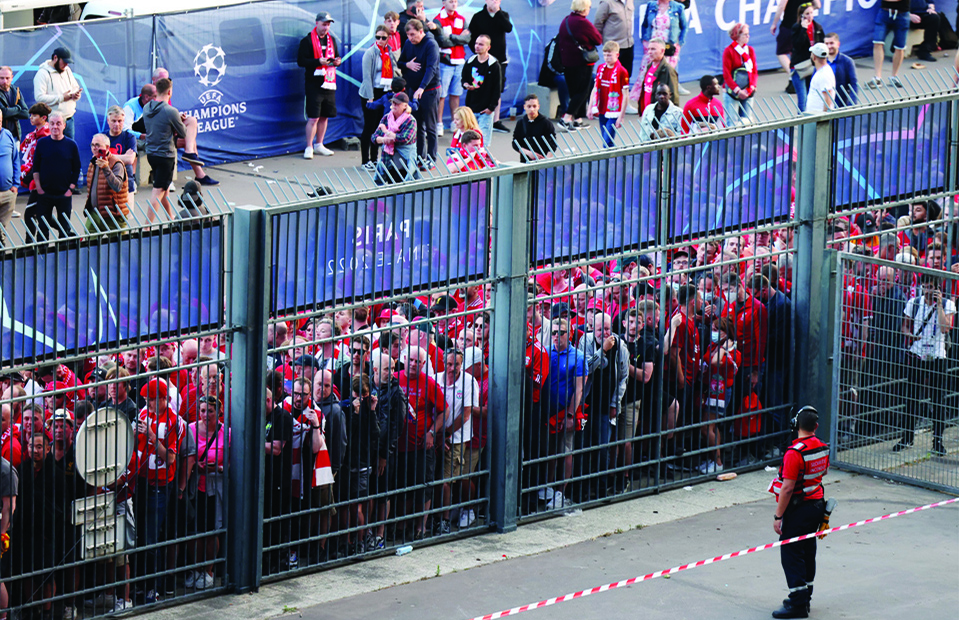 PARIS: In this file photograph, Liverpool fans stand outside unable to get in in time leading to the match being delayed prior to the UEFA Champions League final football match between Liverpool and Real Madrid at the Stade de France in Saint-Denis, north of Paris. - AFP
