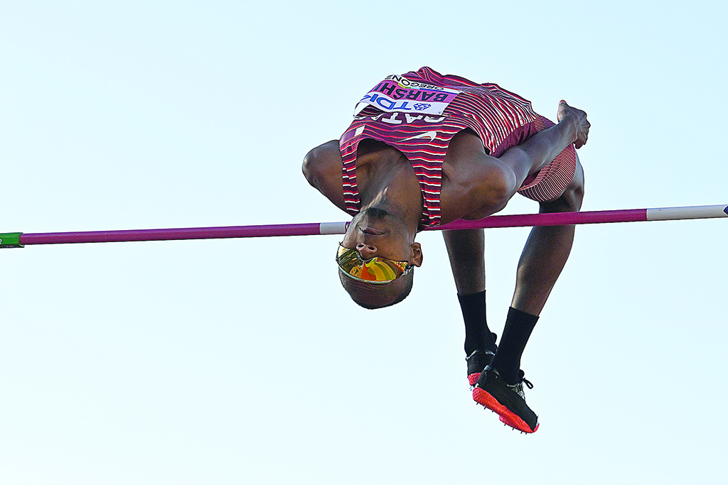 OREGON: Qatar's Mutaz Essa Barshim competes in the men's high jump final during the World Athletics Championships at Hayward Field in Eugene, Oregon on July 18, 2022. - AFP