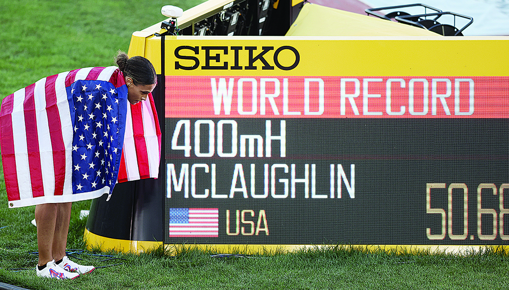 EUGENE: Sydney McLaughlin of Team United States celebrates after winning gold and setting a new world record in the Women's 400m Hurdles Final on day eight of the World Athletics Championships Oregon22 at Hayward Field on July 22, 2022. - AFP
