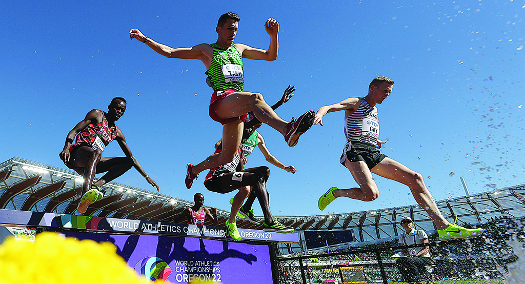 EUGENE: Athletes compete in the Men's 3000 Meter Steeplechase heats on day one of the World Athletics Championships Oregon22 at Hayward Field on July 15, 2022 in Eugene, Oregon. - AFP