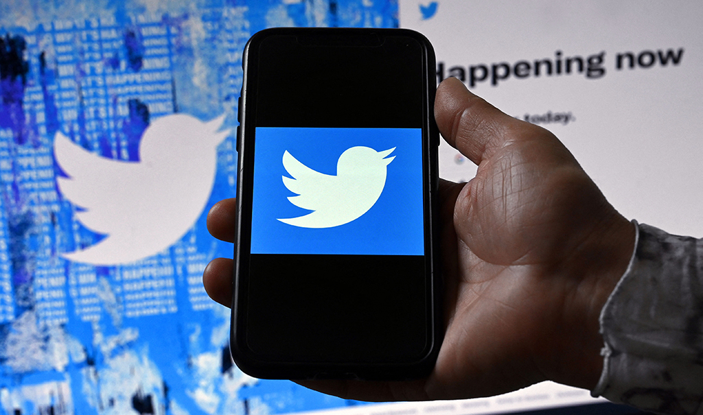 WASHINGTON: A phone screen displays the Twitter logo in Washington, DC. - AFP