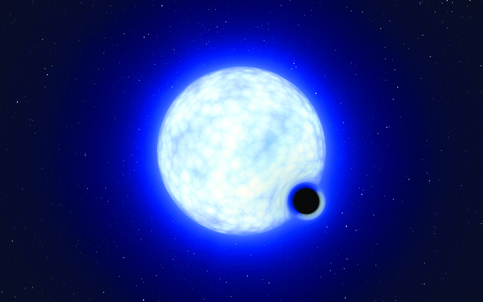 IN SPACE: This handout artist's impression shows the binary system VFTS 243 composed of a blue star with 25 times the Sun's mass and a black hole. - AFP