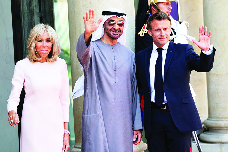 PARIS: France's President Emmanuel Macron and his wife Brigitte Macron welcome UAE President Mohamed bin Zayed Al-Nahyan for a working lunch at the Elysee presidential Palace in Paris, on July 18, 2022.- AFP