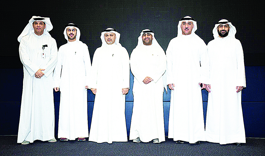 KUWAIT: Officials pose for a group photo on the sidelines of the workshop. - Photo by Yasser Al-Zayyat