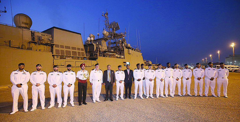 KUWAIT: Indian and Kuwaiti officials pose for a group picture following the arrival of the Indian Naval Ship TEG at Shuwaikh Port. - Photo by Yasser Al-Zayyat