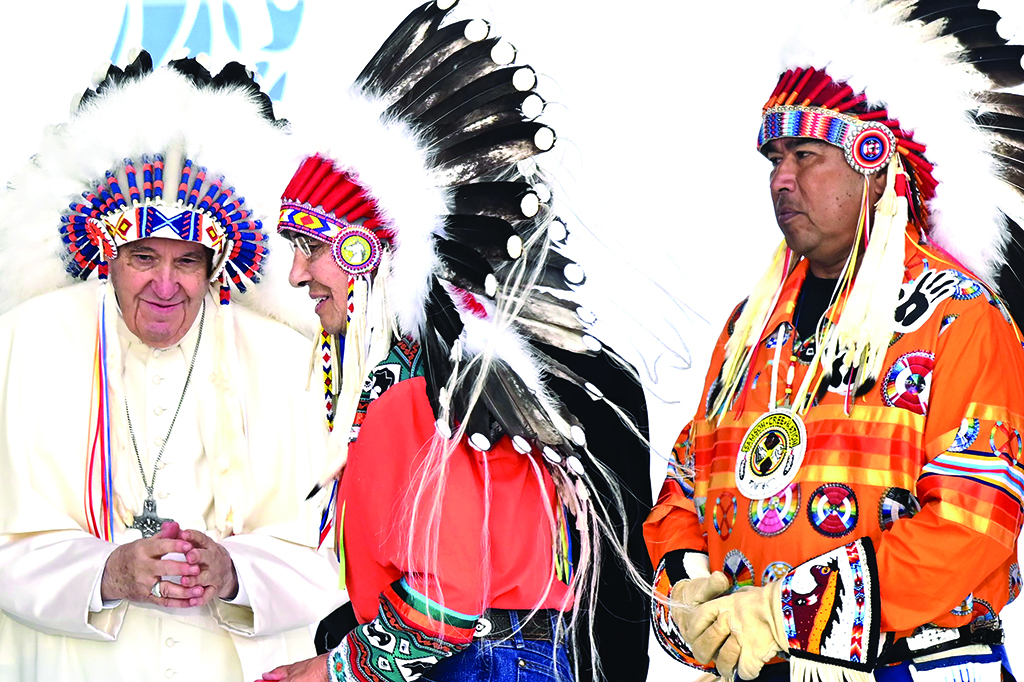 MASKWACIS, Canada: Pope Francis wears a headdress presented to him by Indigenous leaders at Muskwa Park in Maskwacis, Alberta, Canada. – AFP