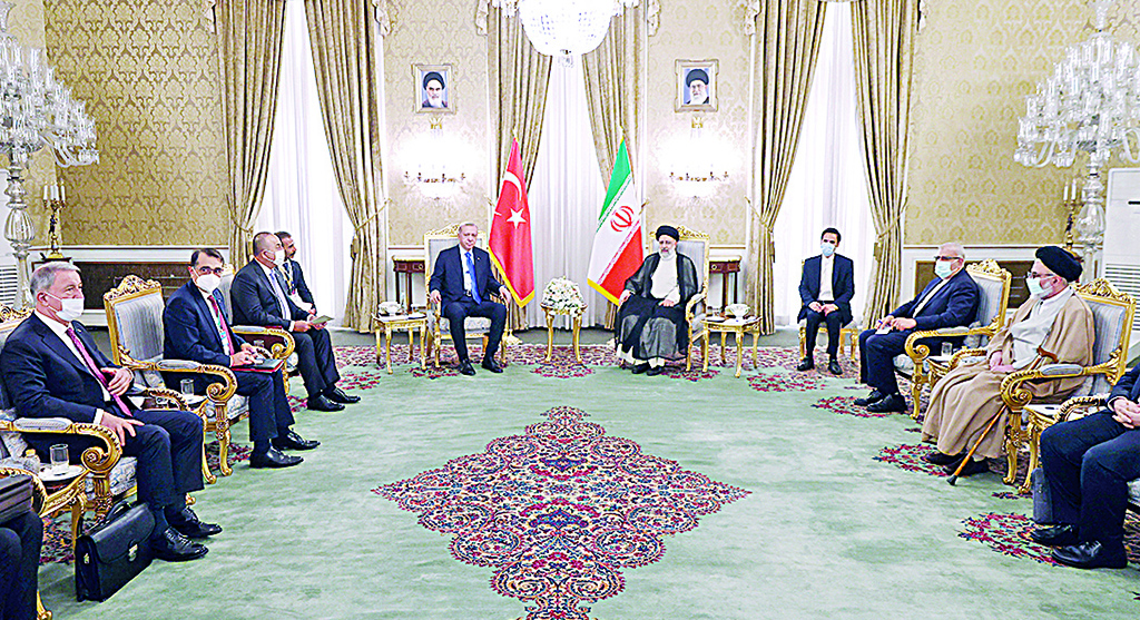 TEHRAN, Iran: Iran's President Ebrahim Raisi (C-R) meeting with Turkey's President Recep Tayyip Erdogan in Tehran on July 19, 2022.- AFP