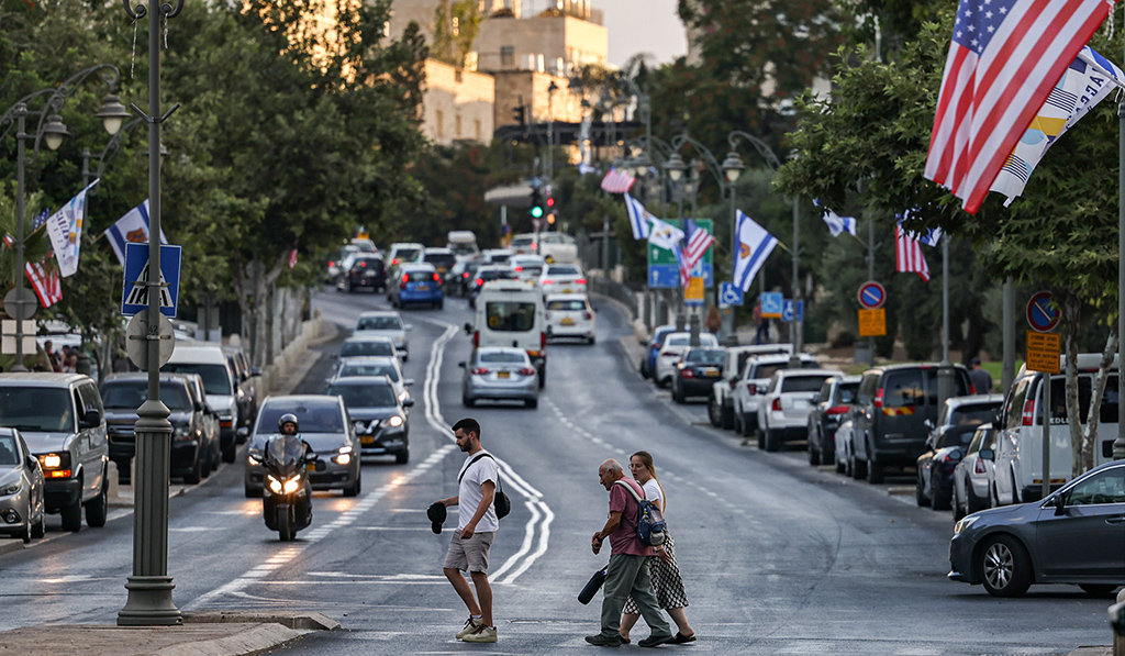JERUSALEM: Flags of the Jerusalem municipality, the US, and Zionist entity are hung up along streets by the municipality, ahead of US President Joe Biden's upcoming visit to Zionist entity. – AFP